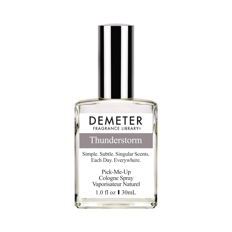 A bottle of Thunderstorm cologne spray by Demeter Fragrance Library with a white label and silver cap.
